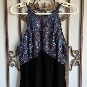 Floor length halter top velvet and sequined gown
